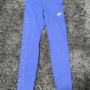 Nike Blue Leggings with Sleek Fit and Iconic Swoosh